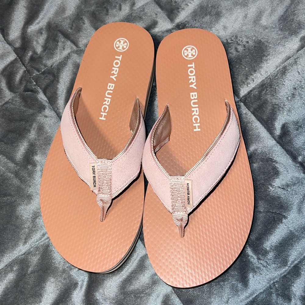 Tory Burch flip flop.